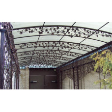 Довгий кований напівкруглий навіс