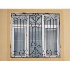 Легкі ковані ґрати на вікно