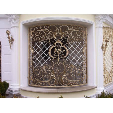 Ковані ґрати золотого кольору