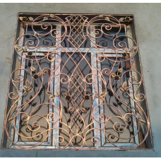 Ковані грати із золотою патиною